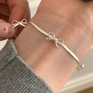 NWT Elegant Sterling Silver Dainty Bow Bracelet!!!!
